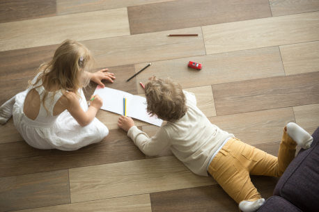 Children on loose lay vinyl flooring