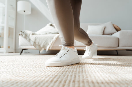 Person walking on carpet