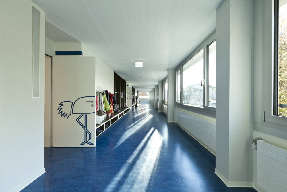 Modern-Public-School-Corridor-Blue-Floor